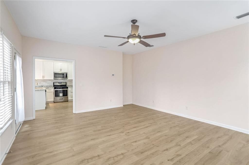 4 bedroom, 3 bathroom, 2,307 sq ft single family residence for sale at 1547 Welch Court, Suwanee, GA 30024 — photo 9