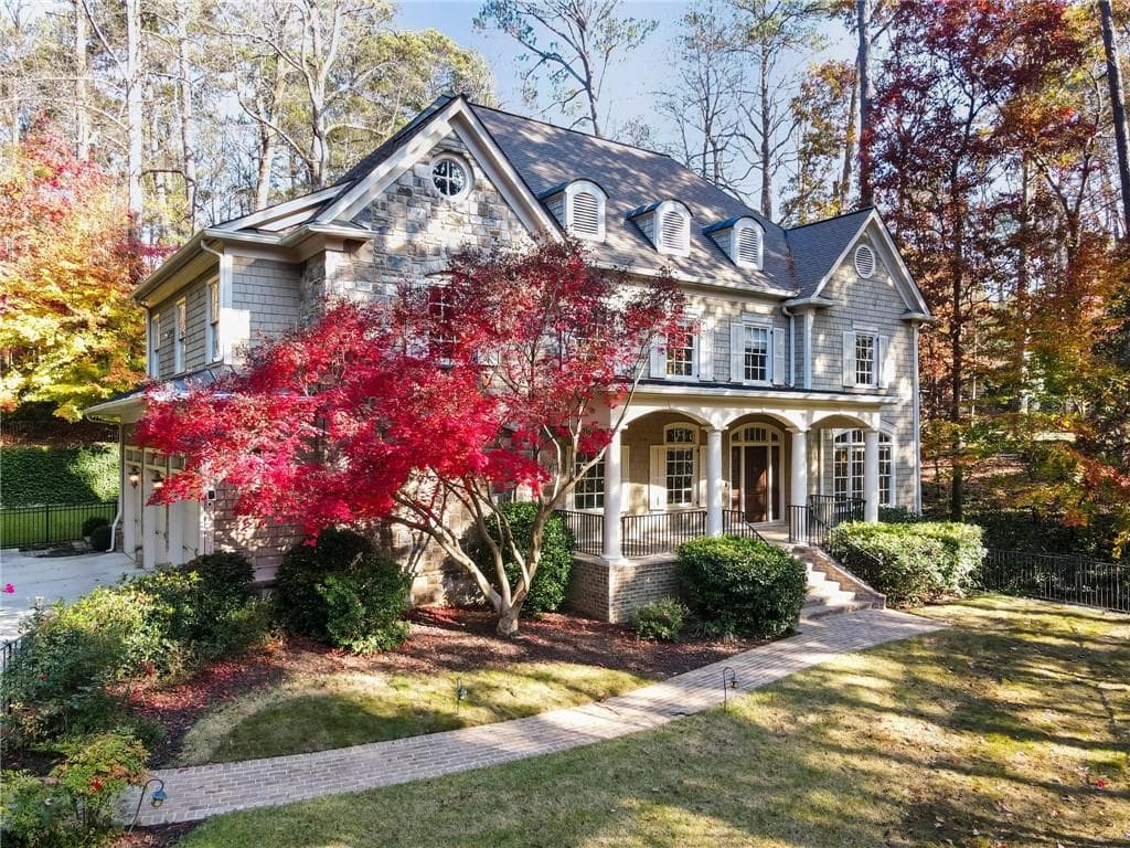 5 bedroom, 7 bathroom, 7,200 sq ft single family residence sold at 1015 Nawench Drive, Atlanta, GA 30327