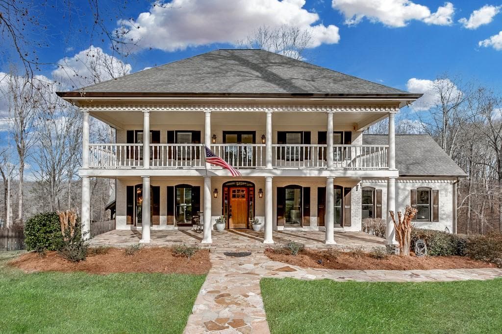 4 bedroom, 4 bathroom single family residence sold at 5074 Wofford Mill Road, Flowery Branch, GA 30542