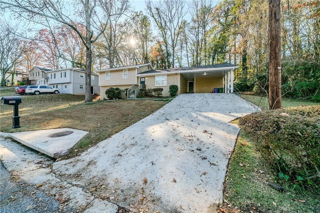 5 bedroom, 4 bathroom single family residence sold at 1394 High Meadow Drive, Stone Mountain, GA 30083