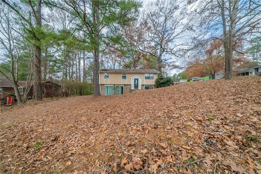 4 bedroom, 3 bathroom, 2,047 sq ft single family residence sold at 4690 Big Valley Court, Stone Mountain, GA 30083