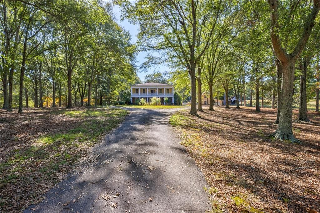 4 bedroom, 2 bathroom single family residence sold at 1490 Lee Peters Road, Loganville, GA 30052