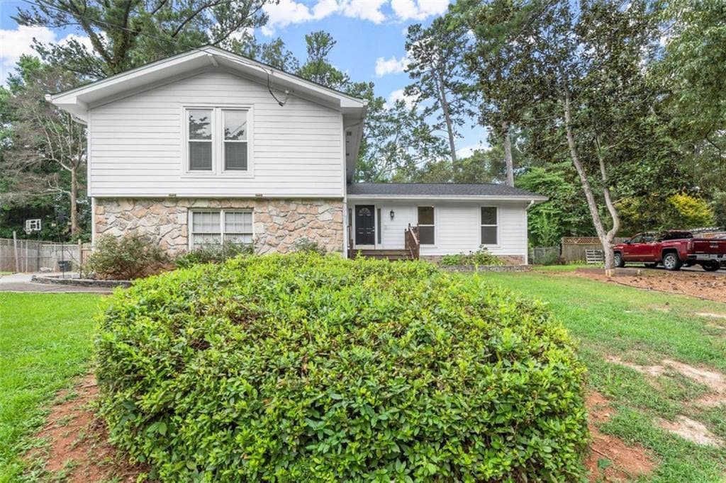 4 bedroom, 3 bathroom single family residence sold at 855 Riverbend Drive, Lilburn, GA 30047