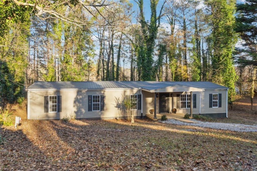 4 bedroom, 3 bathroom single family residence sold at 5141 Smith Lane, Gainesville, GA 30506