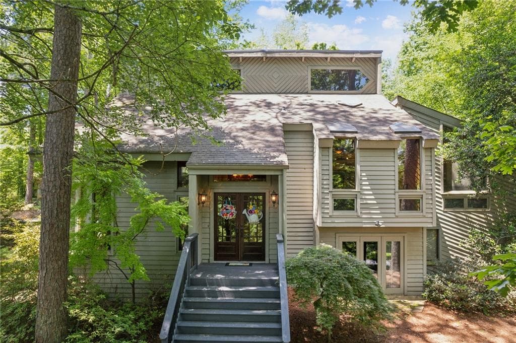 4 bedroom, 3 bathroom, 4,100 sq ft single family residence sold at 5090 Nesbit Ferry Lane, Atlanta, GA 30350