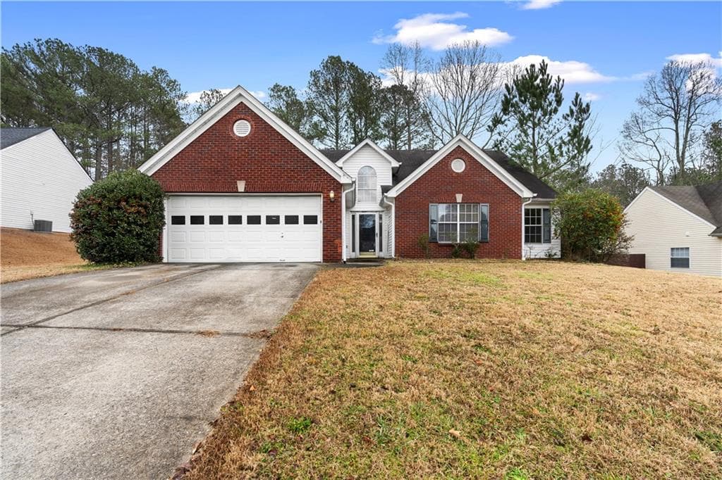 4 bedroom, 2 bathroom single family residence sold at 1305 Wilkes Crest Drive, Dacula, GA 30019