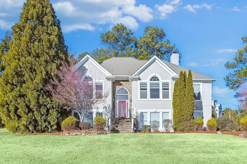 4 bedroom, 3 bathroom single family residence sold at 6733 Holiday Point, Buford, GA 30518