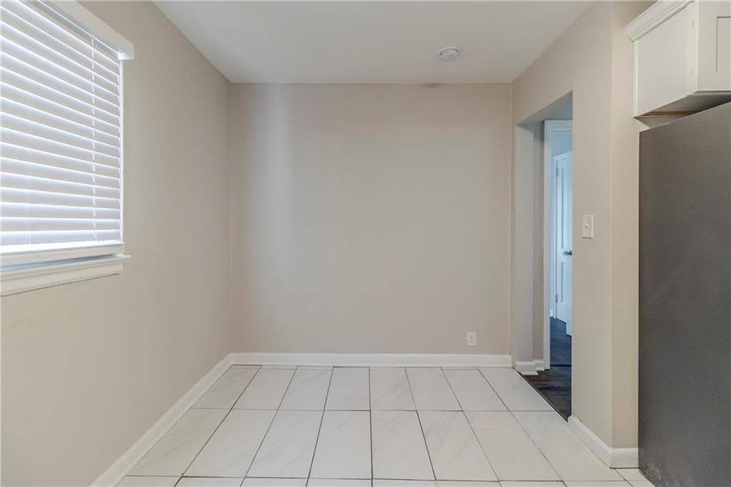 4 bedroom, 1 bathroom, 957 sq ft single family residence for sale at 2446 Lynn Iris Drive, Decatur, GA 30032 — photo 4