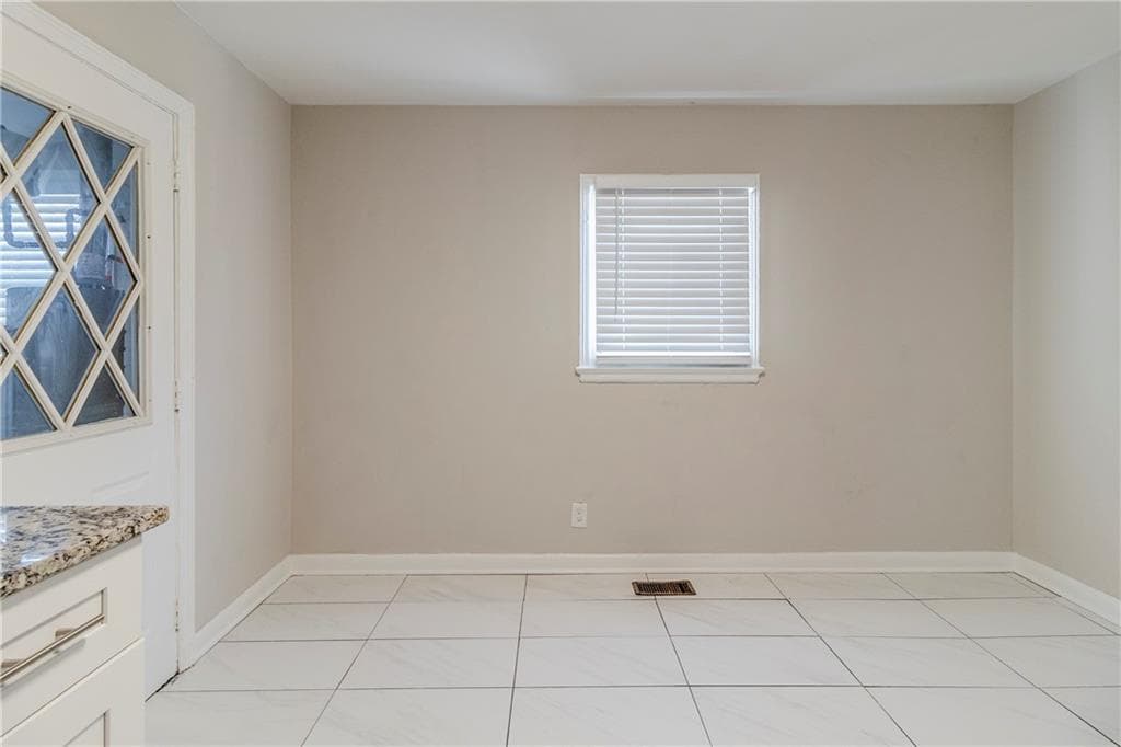4 bedroom, 1 bathroom, 957 sq ft single family residence for sale at 2446 Lynn Iris Drive, Decatur, GA 30032 — photo 5