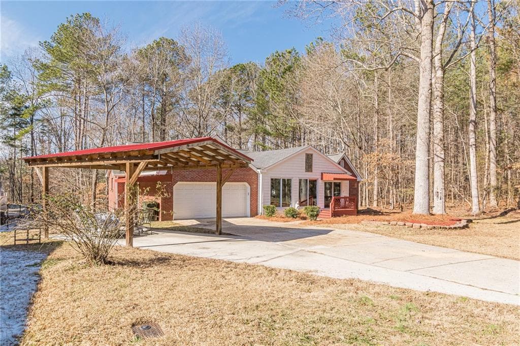 3 bedroom, 2 bathroom, 1,407 sq ft single family residence sold at 1077 Coach Bobby Dodd Road, Dallas, GA 30132
