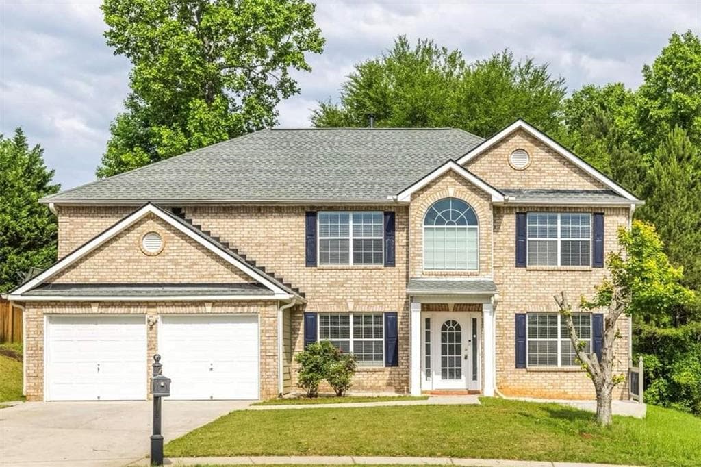 4 bedroom, 3 bathroom single family residence sold at 1598 Blue Spruce Lane, Conyers, GA 30012