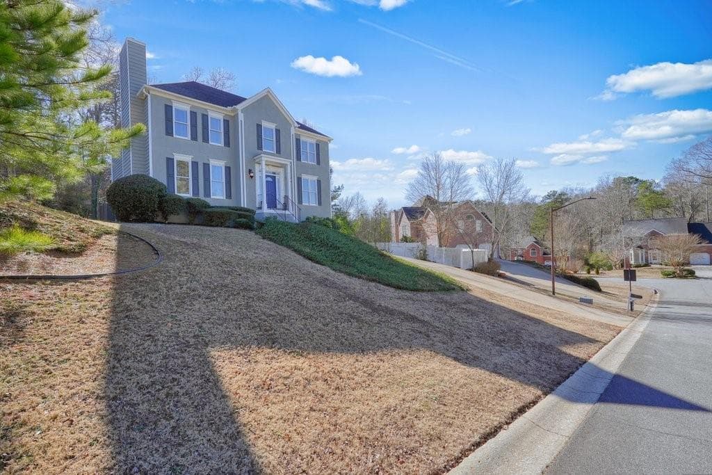 4 bedroom, 3 bathroom, 2,292 sq ft single family residence sold at 2945 Masonwood Drive, Kennesaw, GA 30152