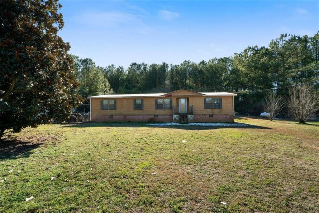 3 bedroom, 2 bathroom single family residence sold at 215 Grogan Road, Buchanan, GA 30113