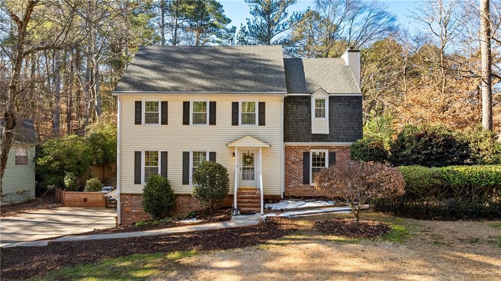 4 bedroom, 3 bathroom, 2,300 sq ft single family residence sold at 9735 Hillside Drive, Roswell, GA 30076