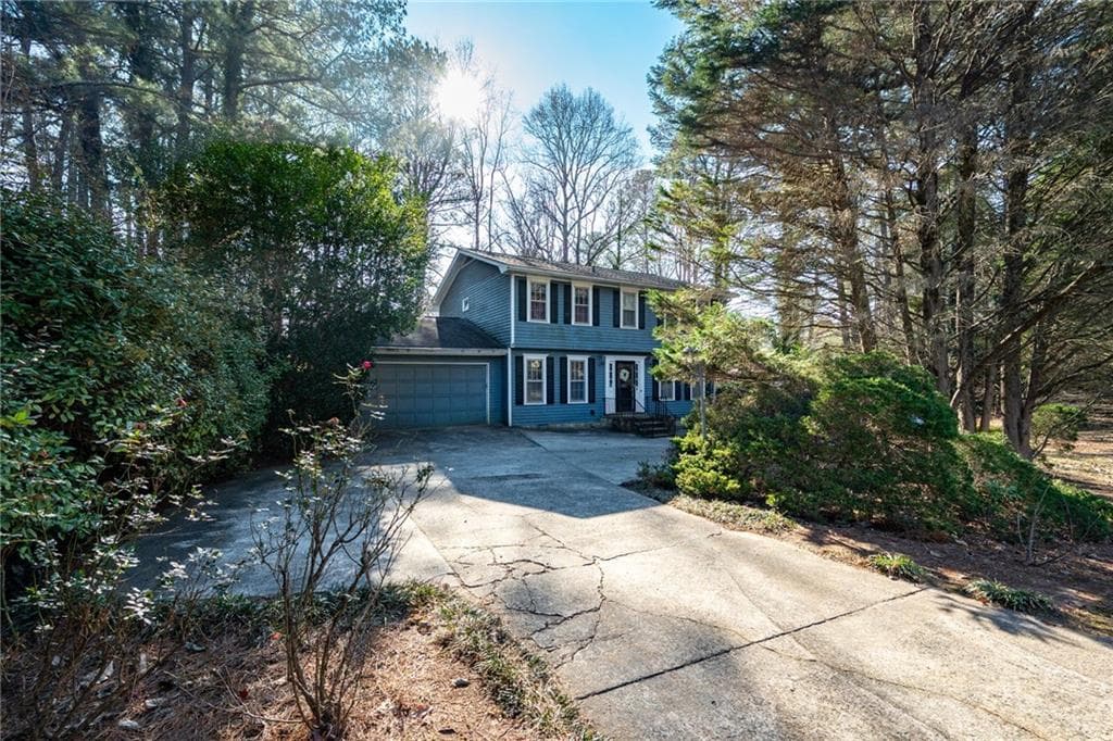 4 bedroom, 3 bathroom single family residence sold at 4618 Shallowford Road, Roswell, GA 30075