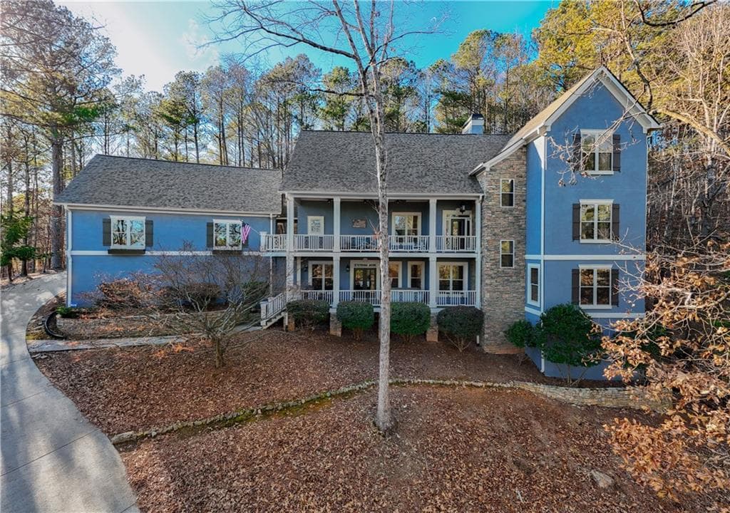 6 bedroom, 5 bathroom, 5,088 sq ft single family residence sold at 1053 Fairway Valley Drive, Woodstock, GA 30189