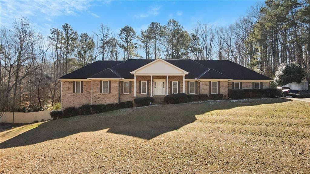 6 bedroom, 6 bathroom single family residence sold at 157 Timberlost Trail, Suwanee, GA 30024