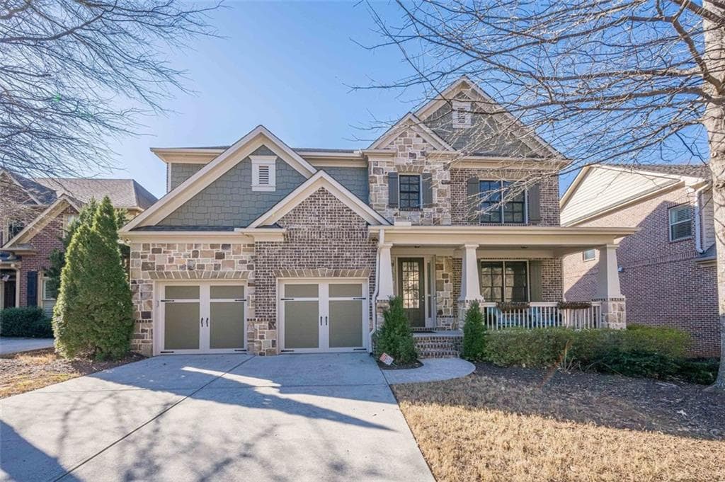 5 bedroom, 6 bathroom, 4,831 sq ft single family residence sold at 9994 Inisfree Drive, Johns Creek, GA 30022