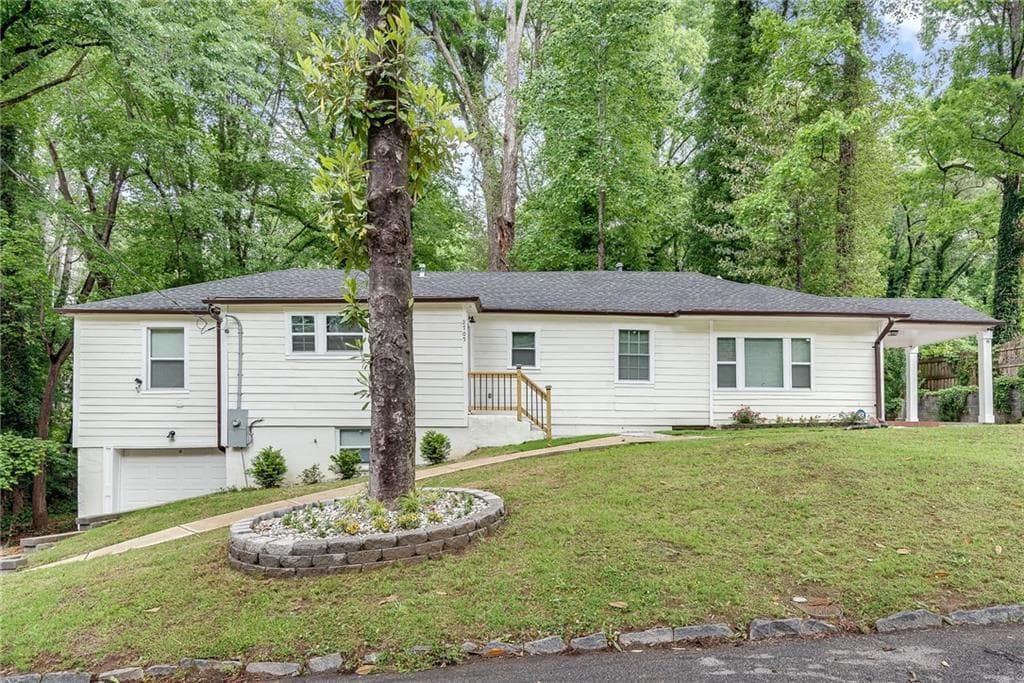 6 bedroom, 3 bathroom single family residence sold at 2705 Baker Ridge Drive, Atlanta, GA 30318