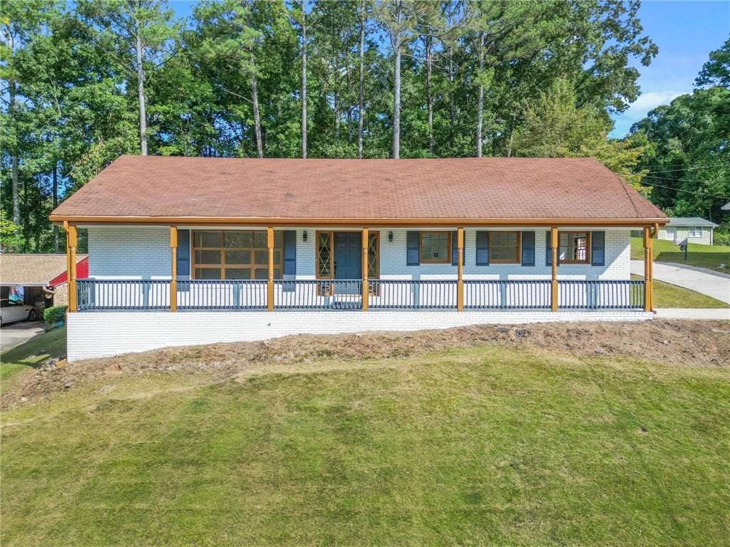 4 bedroom, 3 bathroom single family residence sold at 2815 Spain Drive, East Point, GA 30344