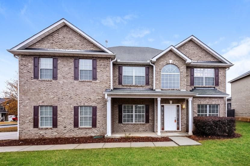 6 bedroom, 4 bathroom, 3,706 sq ft single family residence sold at 5010 Mundy Drive, Cumming, GA 30028
