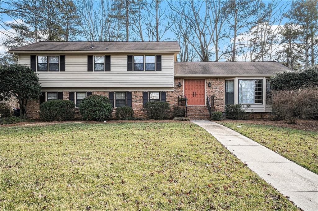 4 bedroom, 3 bathroom single family residence sold at 1519 Carnaby Court, Dunwoody, GA 30338