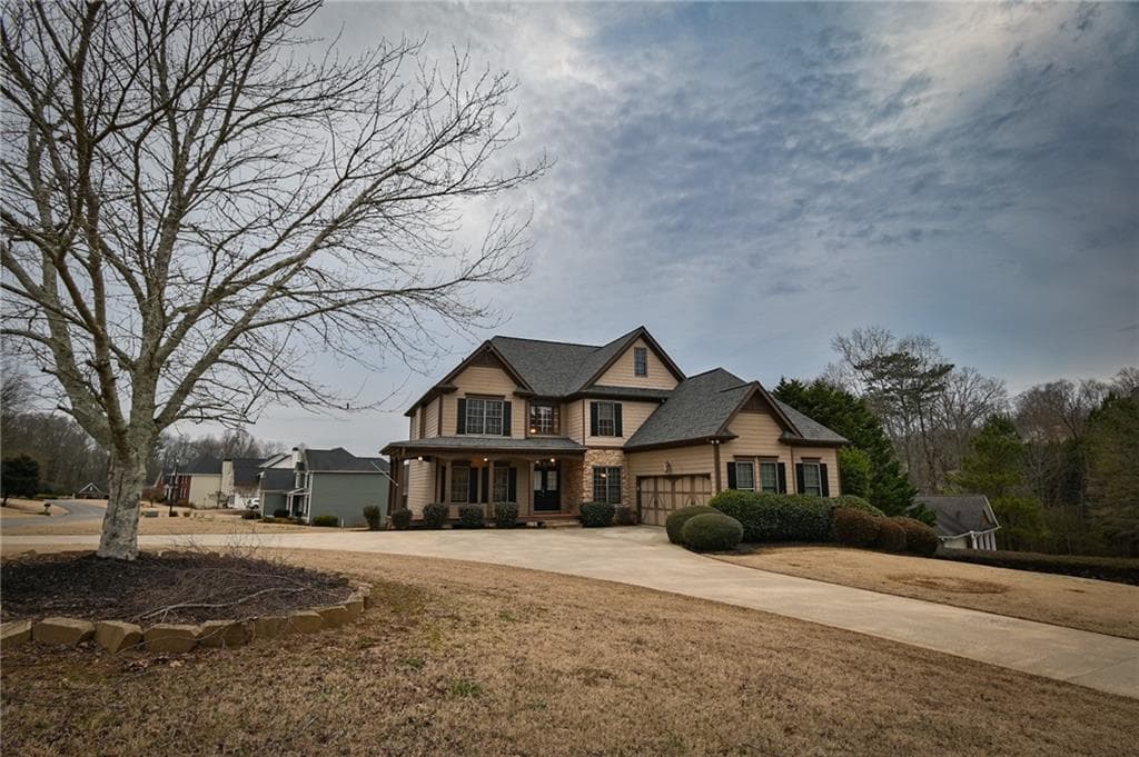 4 bedroom, 5 bathroom single family residence sold at 6310 Talking Tree Court, Cumming, GA 30028