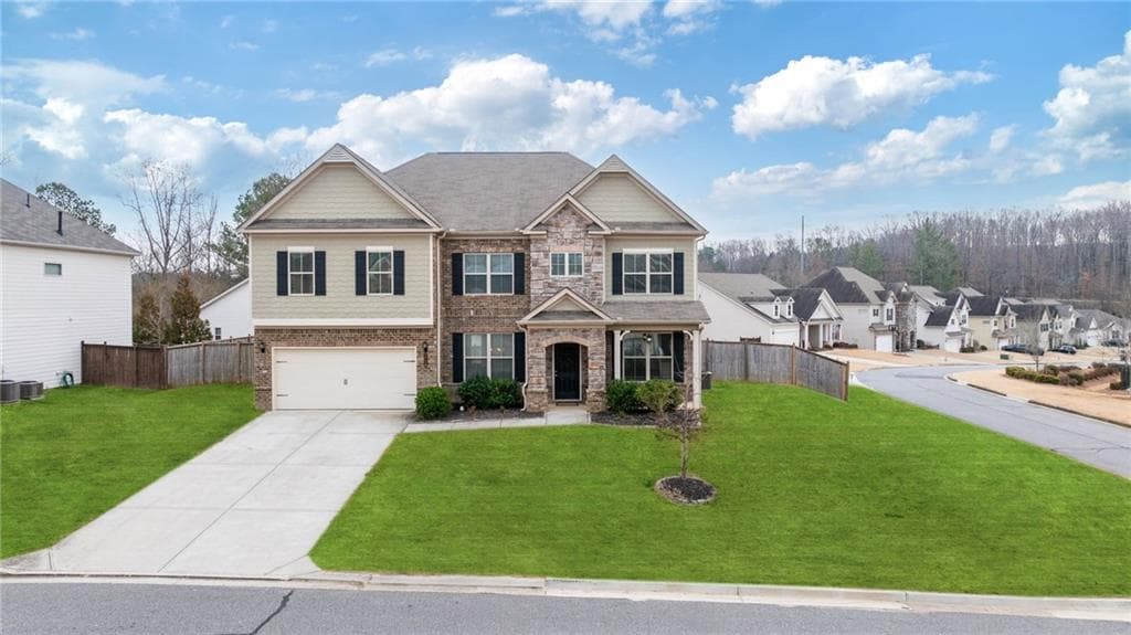 5 bedroom, 4 bathroom single family residence sold at 7710 Tiberon Parkway, Cumming, GA 30028