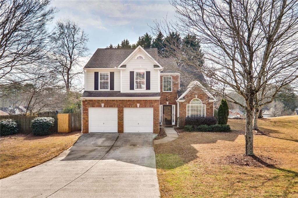4 bedroom, 3 bathroom, 2,232 sq ft single family residence sold at 5220 Antler Court, Suwanee, GA 30024