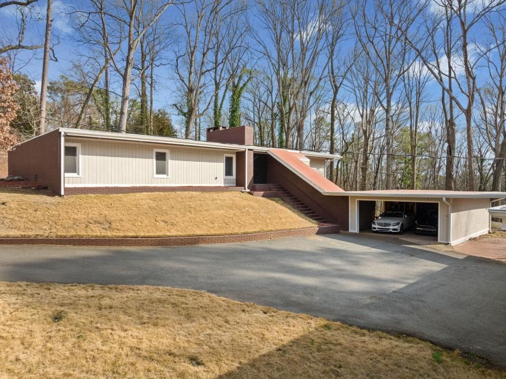 5 bedroom, 4 bathroom, 5,832 sq ft single family residence sold at 1300 Indian Trail, Atlanta, GA 30327