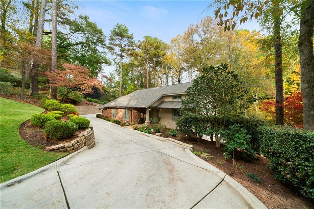 4 bedroom, 3 bathroom, 3,821 sq ft single family residence sold at 5525 Whitner Drive, Sandy Springs, GA 30327