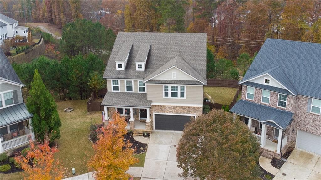 6 bedroom, 5 bathroom single family residence sold at 322 Kells Court, Woodstock, GA 30188