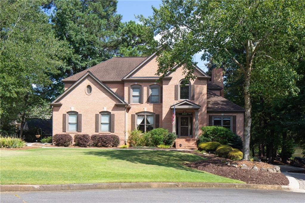 5 bedroom, 4 bathroom single family residence sold at 502 Lakegreen Court, Suwanee, GA 30024