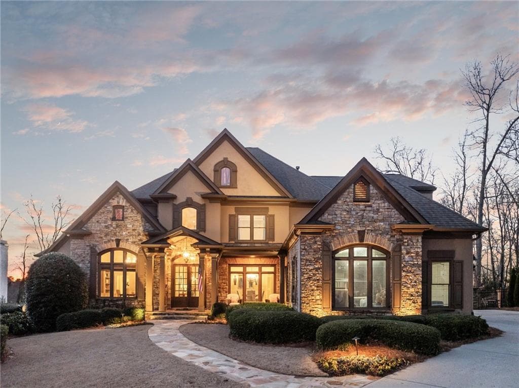 6 bedroom, 7 bathroom single family residence sold at 6955 Laurel Oak Drive, Suwanee, GA 30024