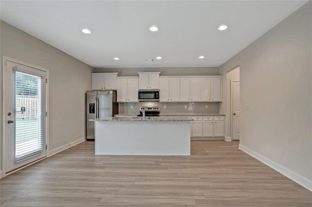 4 bedroom, 3 bathroom, 2,228 sq ft single family residence for rent at 112 Chase Landing Drive Stonewycke, Loganville, GA 30052 for $2,598 a month — photo 2