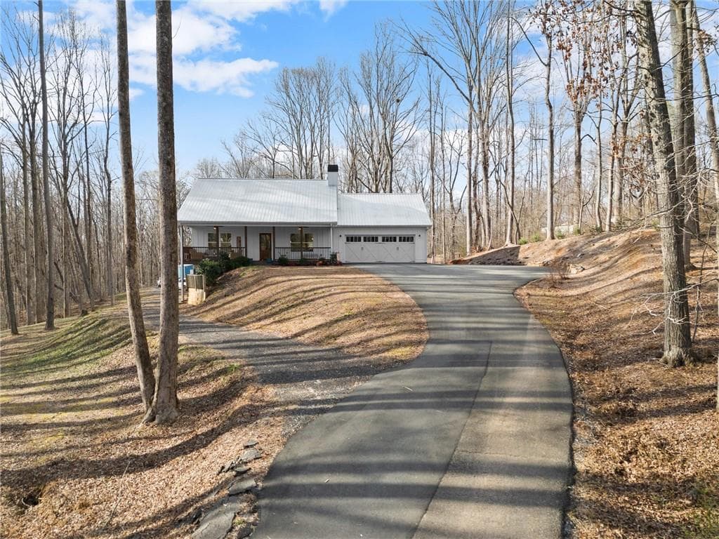 4 bedroom, 3 bathroom single family residence sold at 1143 Highway 9, Dawsonville, GA 30534
