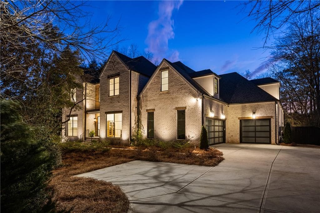 7 bedroom, 8 bathroom, 7,611 sq ft single family residence sold at 5060 Lake Forrest Drive, Atlanta, GA 30342