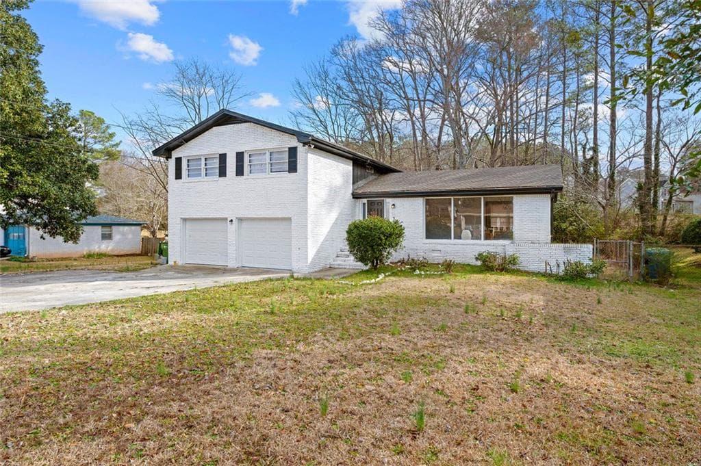 4 bedroom, 3 bathroom single family residence sold at 3875 Wisteria Lane, Atlanta, GA 30331