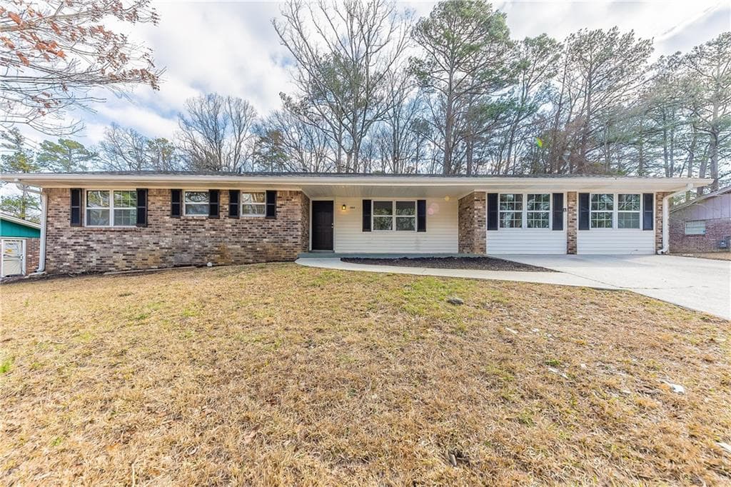 4 bedroom, 2 bathroom single family residence sold at 3884 Rockey Valley Drive, Conley, GA 30288