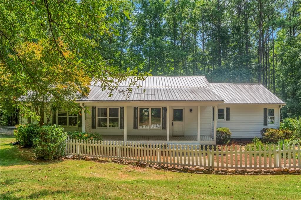 3 bedroom, 2 bathroom single family residence sold at 2170 Leguin Mill Road, Locust Grove, GA 30248