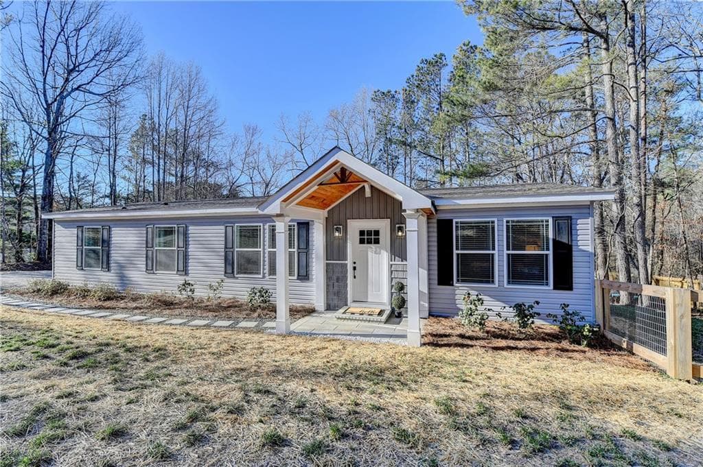 3 bedroom, 2 bathroom single family residence sold at 215 Hogan Pond Lane, Ball Ground, GA 30107