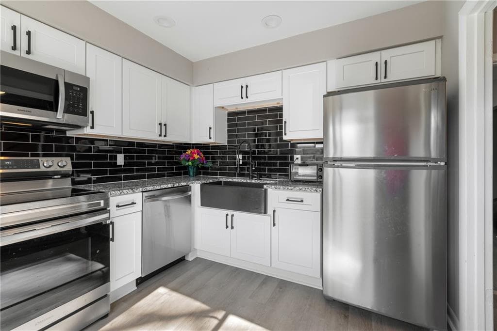 4 bedroom, 3 bathroom, 1,578 sq ft condominium sold at 1056 COUNTRY Court, Lawrenceville, GA 30044