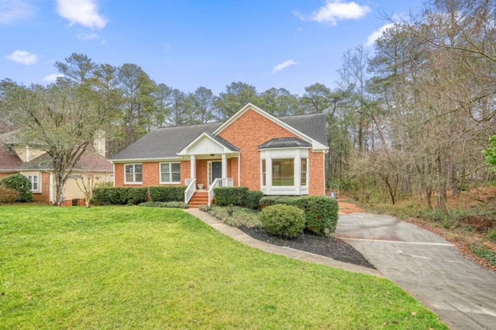 4 bedroom, 3 bathroom single family residence sold at 2274 Glenridge Drive, Marietta, GA 30062