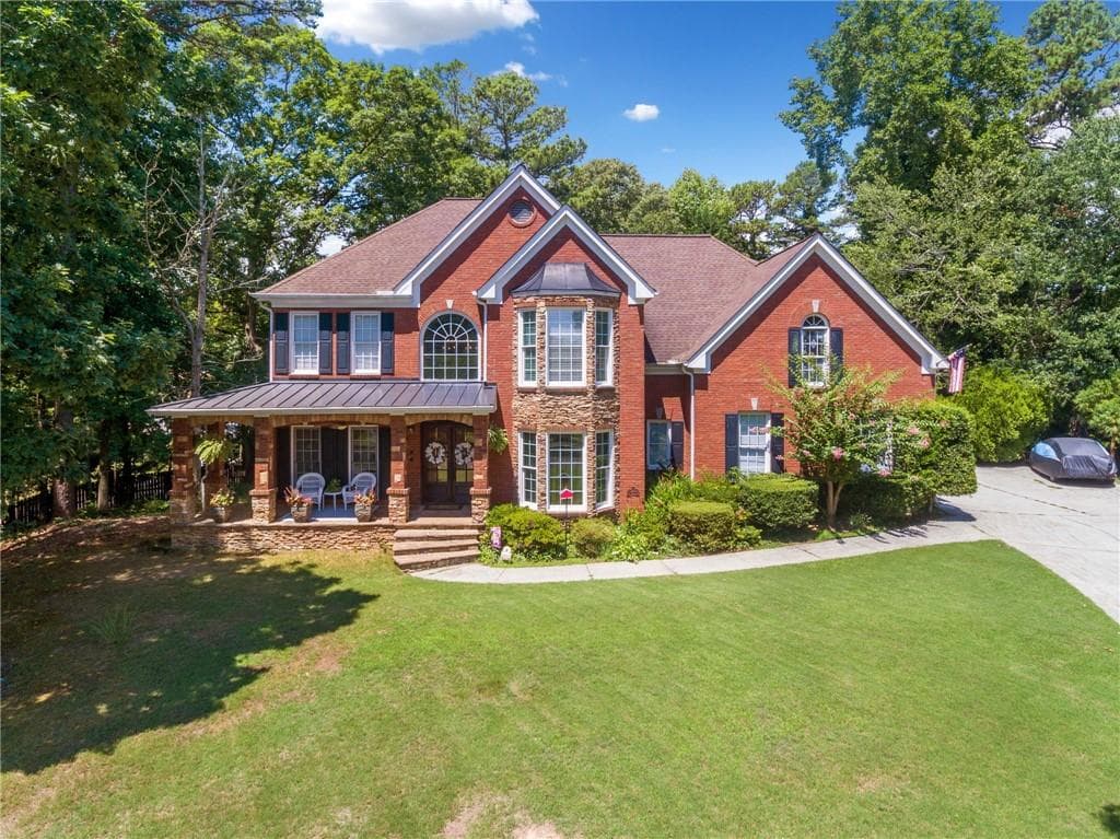 4 bedroom, 5 bathroom single family residence sold at 475 Highland Gate Circle, Suwanee, GA 30024