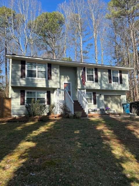 4 bedroom, 2 bathroom single family residence sold at 1677 Grey Fox Court, Lawrenceville, GA 30044
