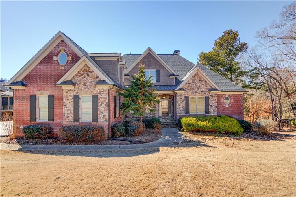 5 bedroom, 8 bathroom, 7,299 sq ft single family residence sold at 5016 Deer Creek Court, Flowery Branch, GA 30542