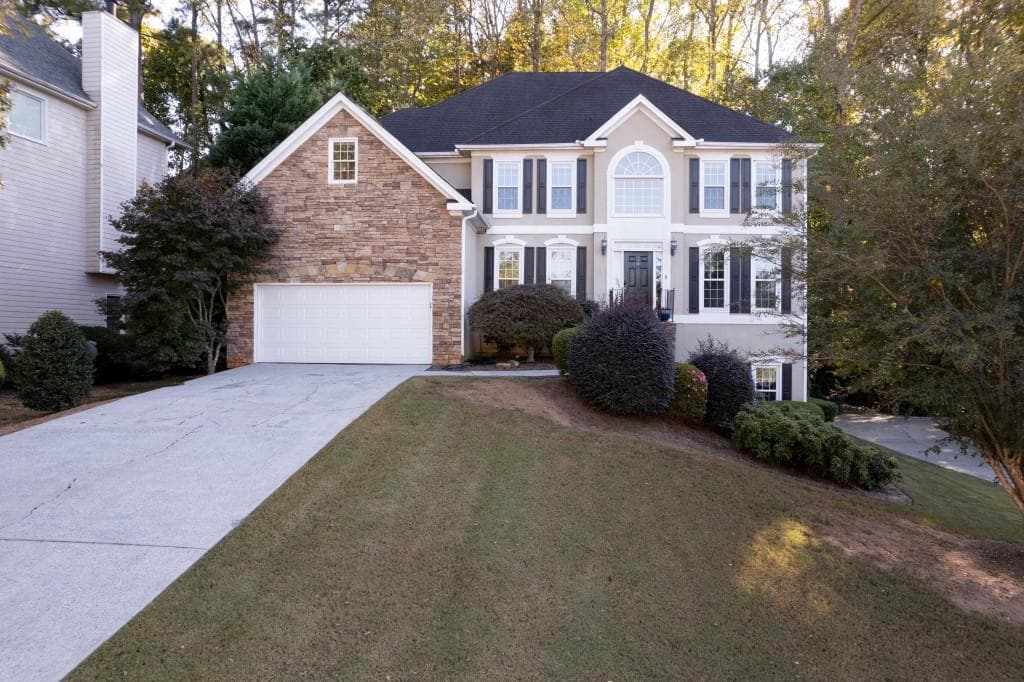 6 bedroom, 4 bathroom single family residence sold at 314 Lake Bluff Court, Suwanee, GA 30024