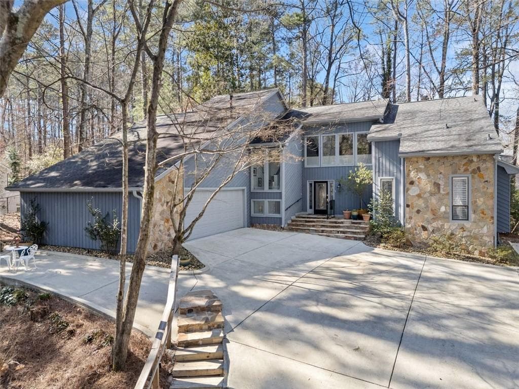 4 bedroom, 4 bathroom, 4,388 sq ft single family residence sold at 990 Ivy Falls Drive, Atlanta, GA 30328