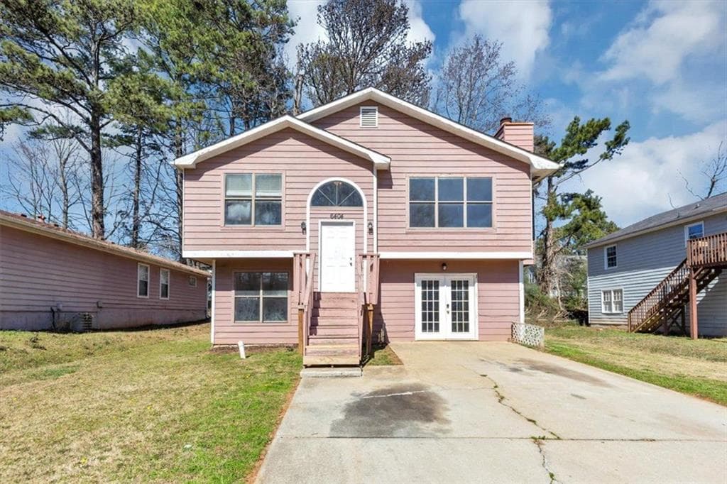 4 bedroom, 3 bathroom single family residence sold at 6404 EASTBRIAR Drive, Lithonia, GA 30058