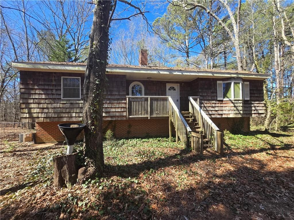 3 bedroom, 2 bathroom, 3,267 sq ft single family residence sold at 6575 Riley Road, Cumming, GA 30028